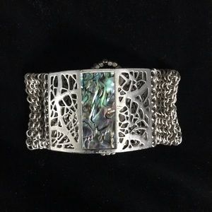 Kenneth Cole bracelet / earring set. Silver